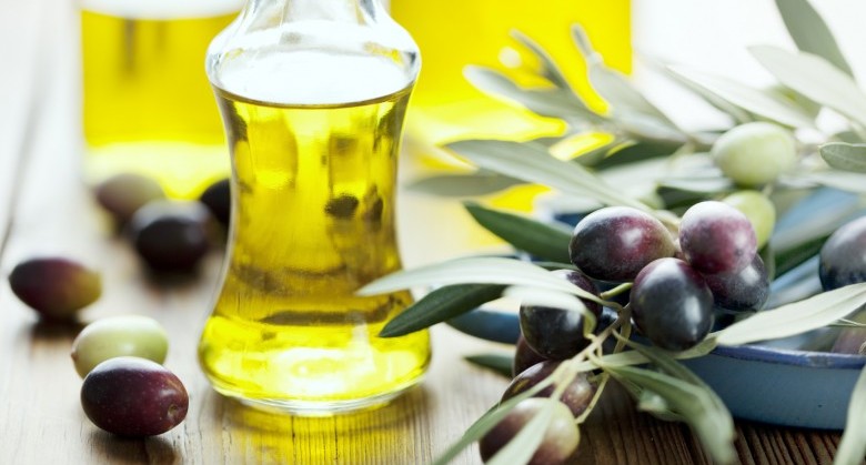 olive oil on wooden table