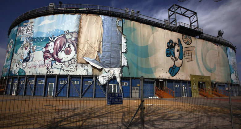 The 2008 Beijing Olympics venue for the beach volleyball competition lies deserted and unmaintained in central Beijing April 2, 2012. The gigantic infrastructures built for the Beijing Olympics, namely the National Stadium, better known as the "Bird's Nest", and the National Aquatics Center, better known as the "Water Cube", are now used for cultural and sports events, reminding the world of the flare that blazed during the summer of 2008. However, some other Beijing Olympic venues, such as the rowing and kayaking centre, baseball arena and BMX track, have been left either deserted or been completely demolished. Picture taken April 2, 2012. ATTENTION EDITORS - 14 of 21 PICTURES FOR PACKAGE 'BEIJING'S DESERTED OLYMPIC SITES' REUTERS/David Gray (CHINA - Tags: SPORT OLYMPICS TPX IMAGES OF THE DAY)