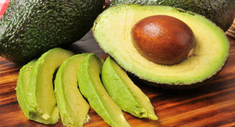 Sliced avocado on a cutting board