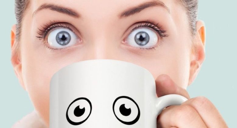 wake-up-mug-woman-drinking-eyes-opened-wide