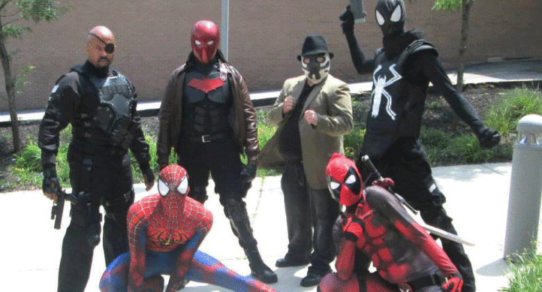 6-adults-dressed-as-comic-book-characters-nick-fury-spiderman-deadpool-rorschach-jason-todd-spiderman-in-symbiote-costume