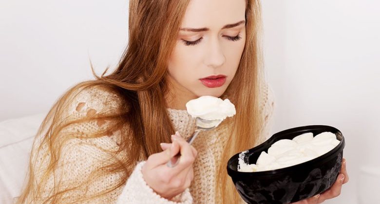 upset-woman-eating-ice-cream